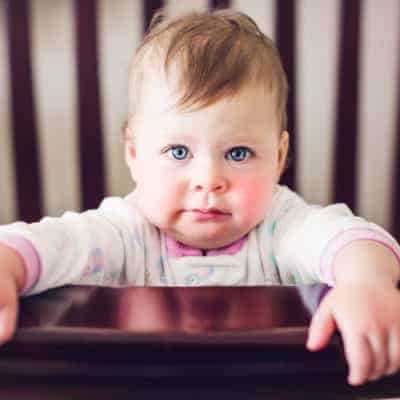 Climbing out of the crib is a phase, but you have to nip it in the bud before it gets worse. Climbing out of the crib can also be unsafe and dangerous so you have to get a handle on it quickly. Safety tips to stop your child from climbing out of the crib. Tips to curb climbing out of the crib and help your kids get a better night's sleep. #climbingoutofthecrib #climbingoutofcrib #gettingoutofbedatnight