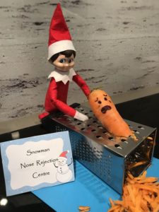 elf on the shelf shredding the snowmans nose